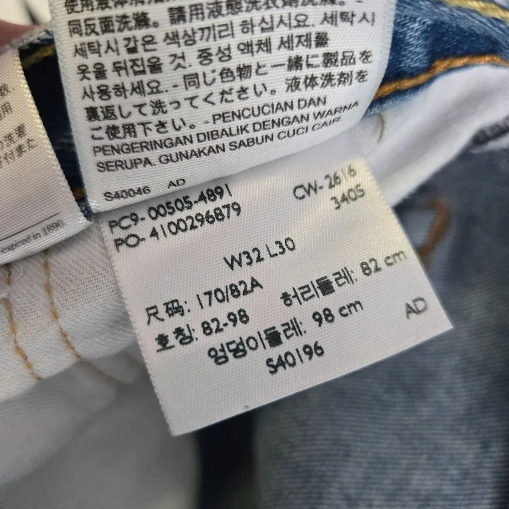 Levis 505 mens size 32x30 on tag hemmed to 27 medium wash blue denim jeans